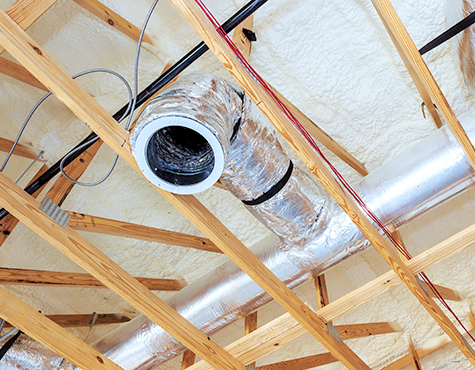 Exposed ducts and wooden beams